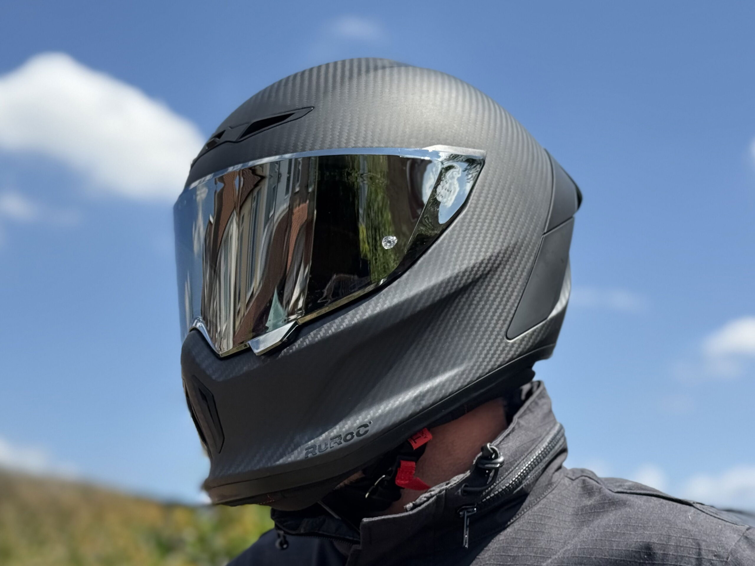 The Ruroc Eox Raw Carbon Motorcycle Helmet