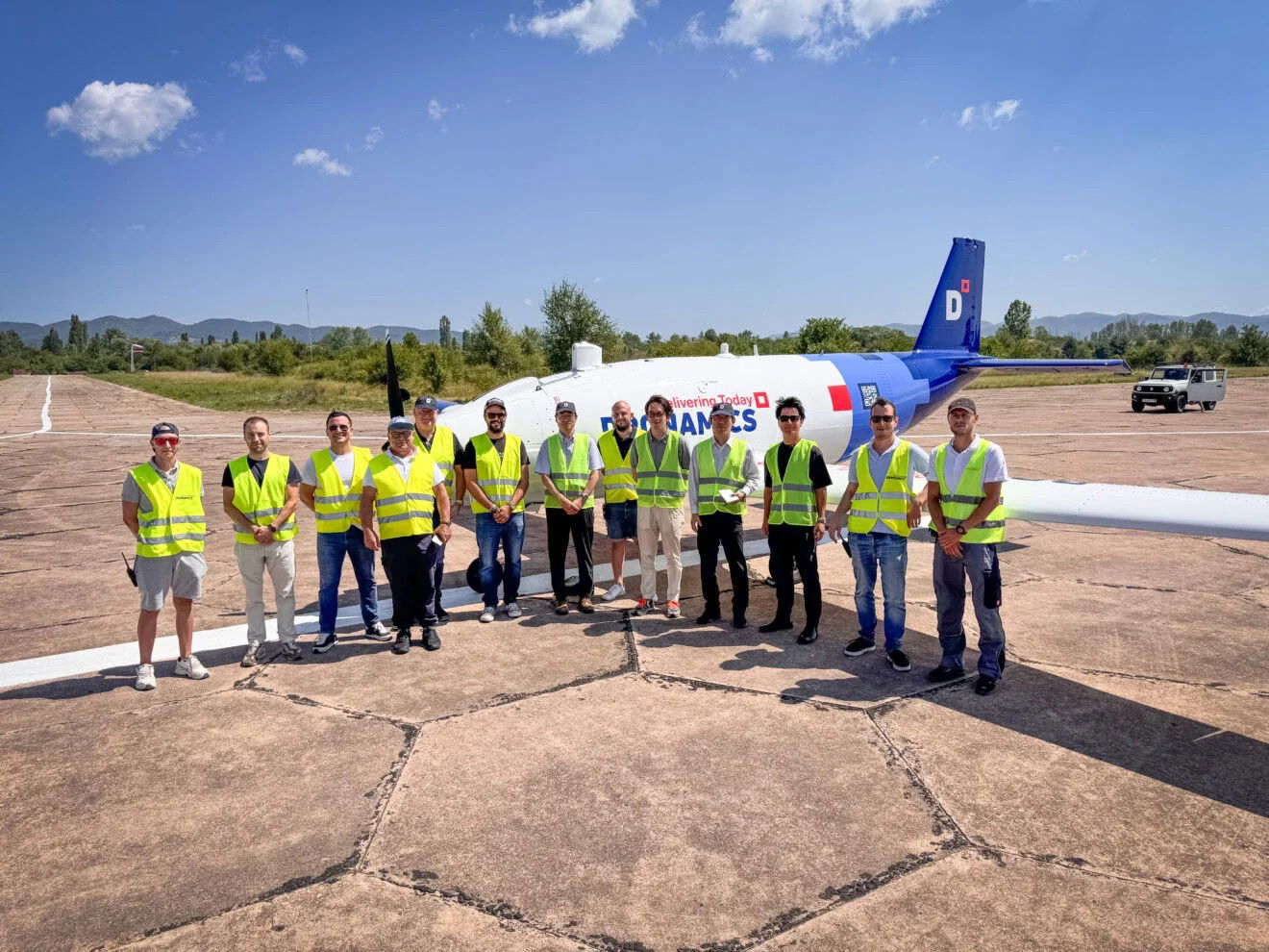 Kawasaki and Dronamics employees Photo credit - Dronamics