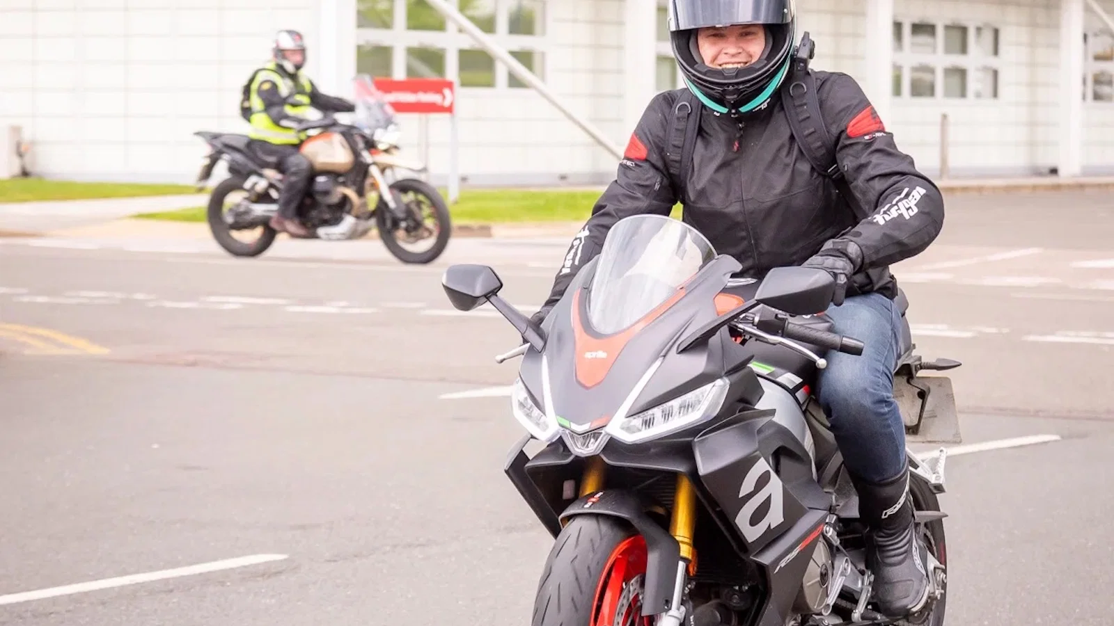 A happy rider on an Aprilia