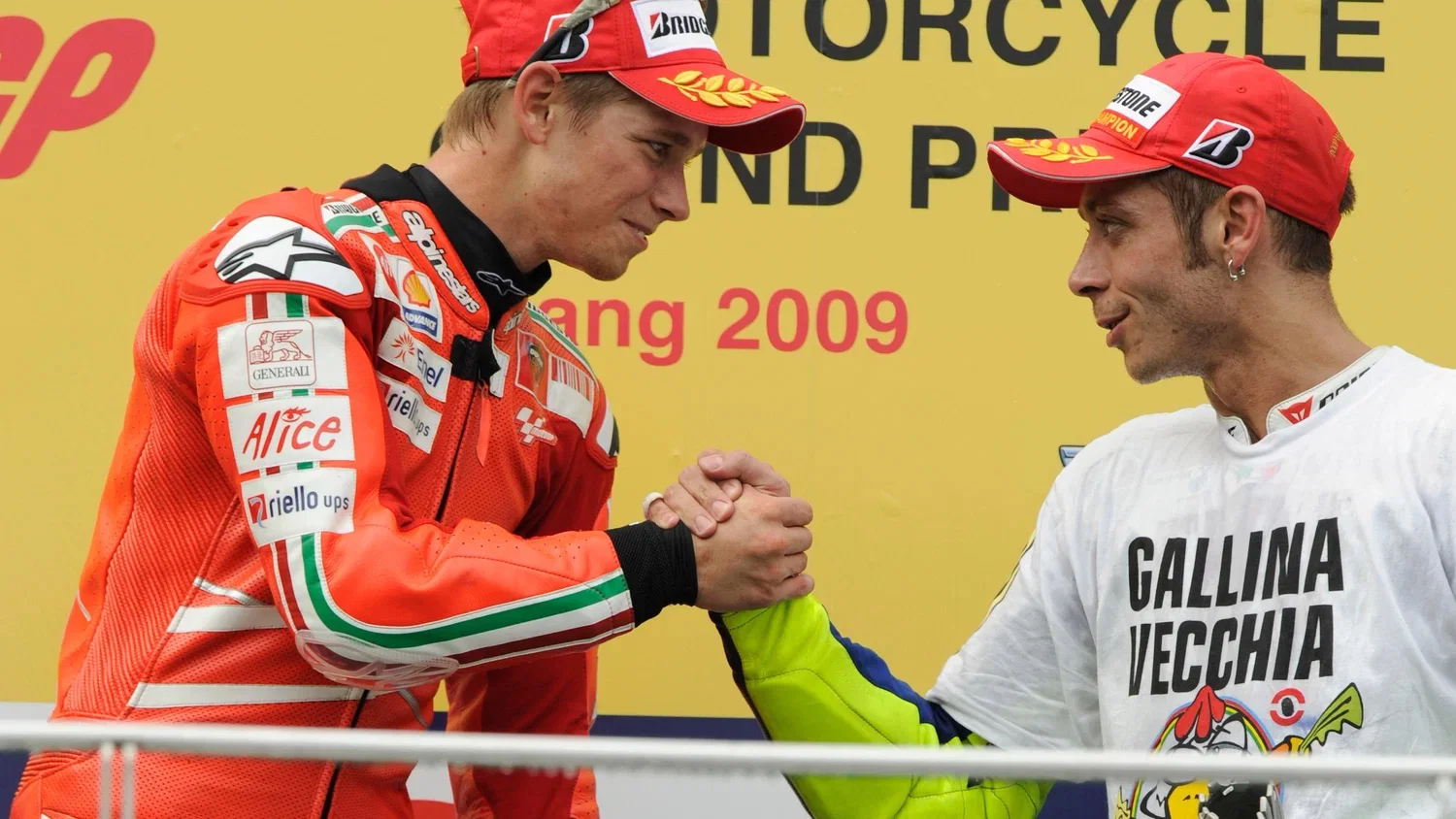Stoner und Rossi auf dem Podium