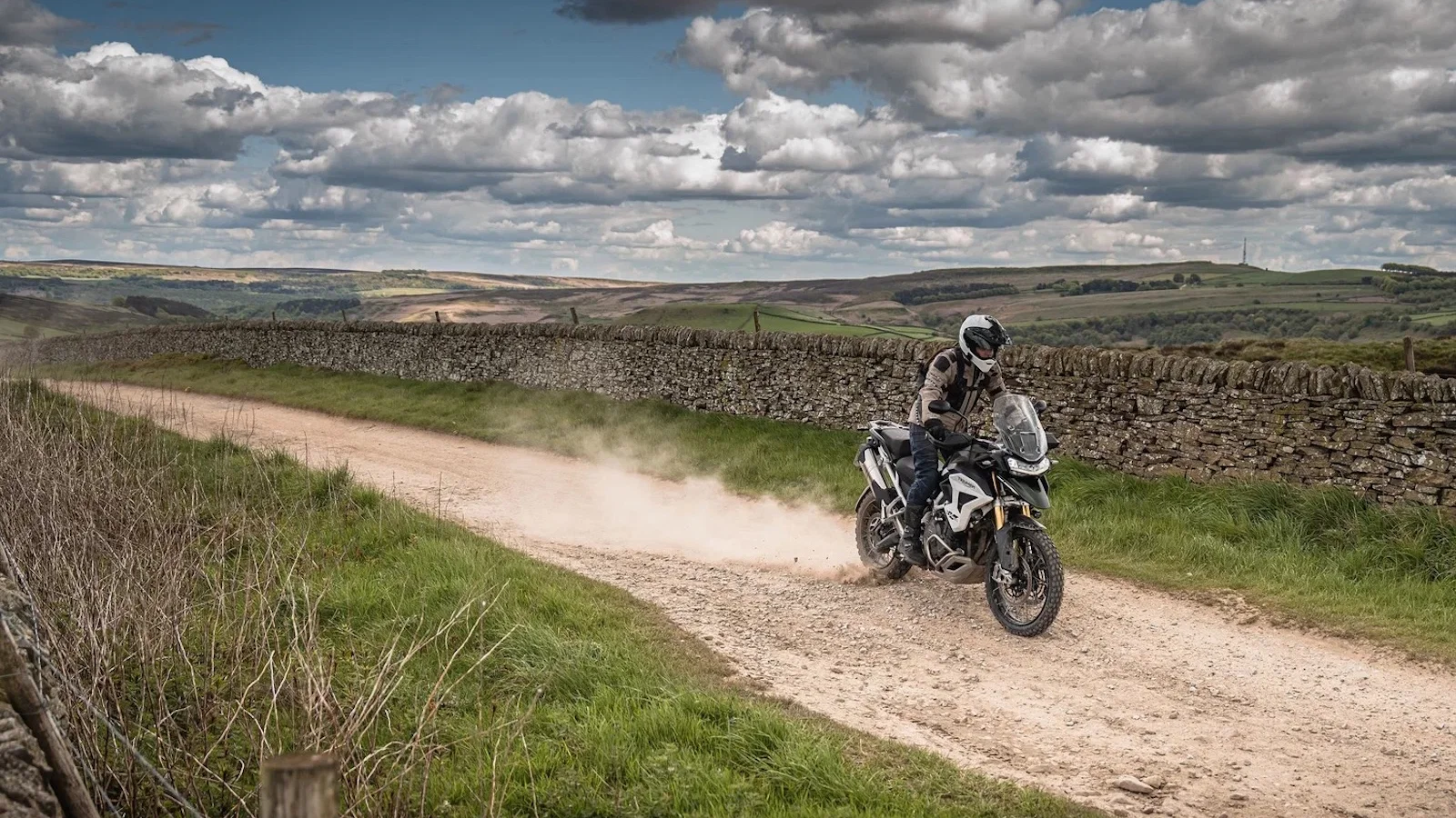 Riding a Tiger 1200 on a green road