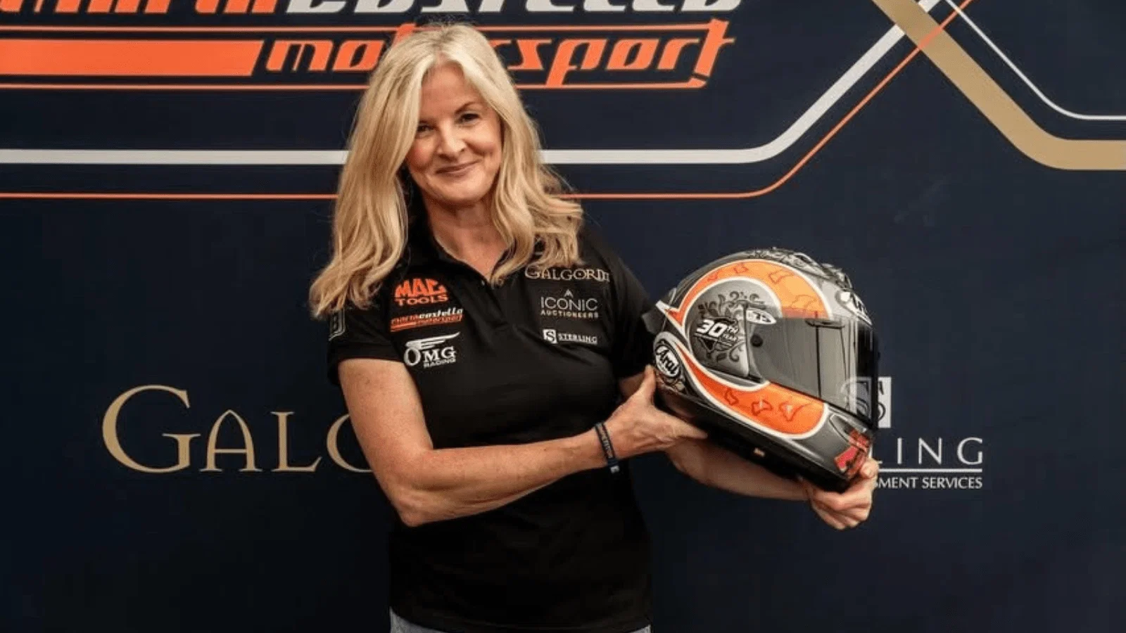 Maria Costello with a special anniversary helmet. Credit: Maria Costello/Facebook.